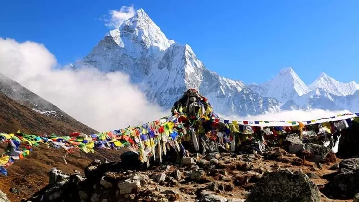 Hikers enjoying the best hikes in Nepal with panoramic Himalayan views