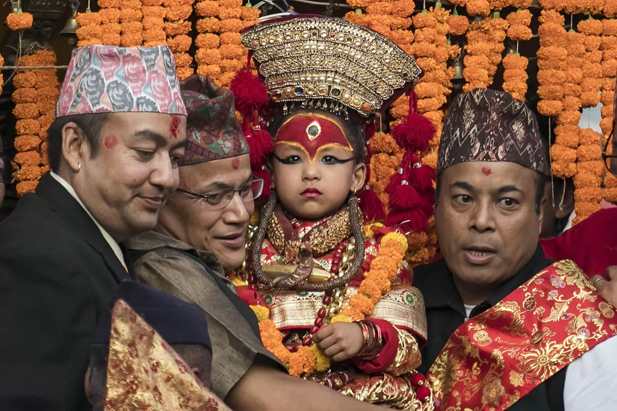 Indra Jatra Festival celebration in Kathmandu Durbar Square with traditional dancers and crowds during Nepal's grandest festival