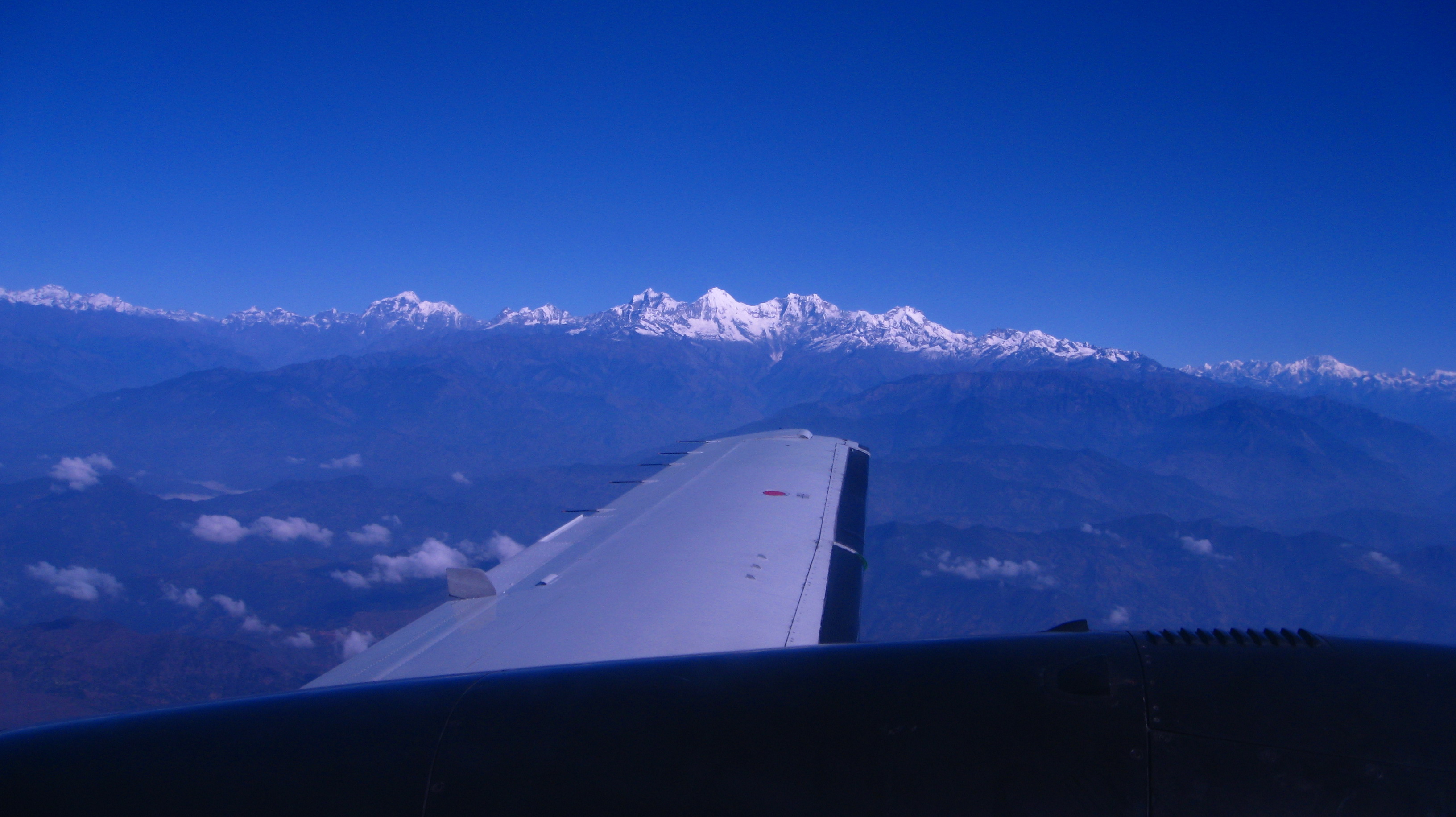 Transfer to Bharatpur airport. Fly to Kathmandu.'