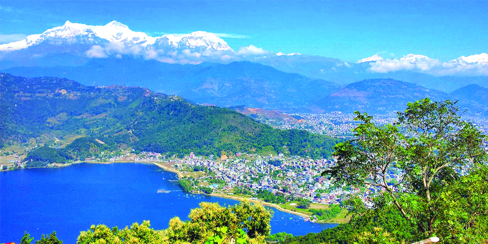 Transfer to airport. Fly to Pokhara.'