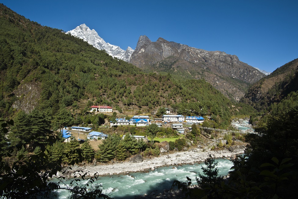  Fly to Lukla. Trek to Phakding. Overnight at mountain Lodge.'