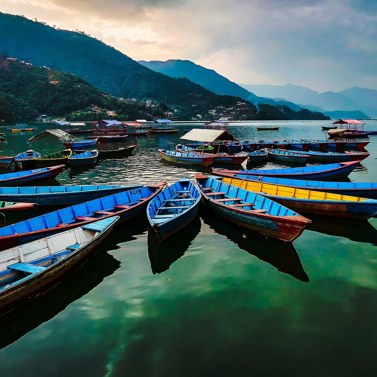 Fly to Pokhara and boating visit of Barahi Temple at Phewa Lake.'